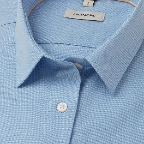 Zoom bild av Light blue female stretch oxford shirt, loose fit